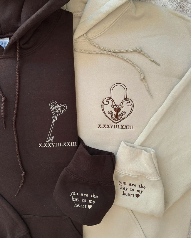 2-Pack: Lock & Key with Custom Date and Sleeve Embroidery Couple Hoodies Hover Image