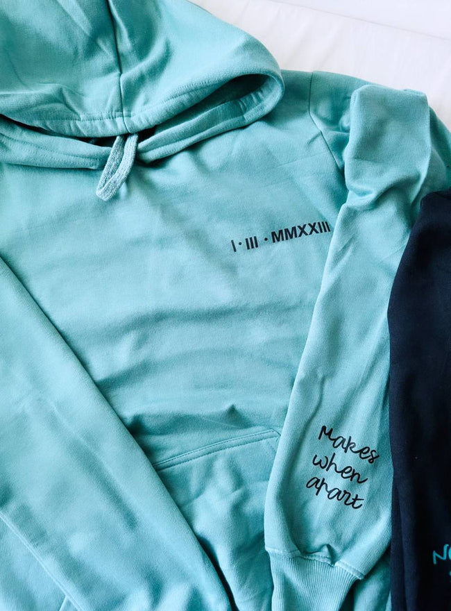 2-Pack Nothing Makes Sense When Apart Black and Sage Green Couple Hoodies Main Image